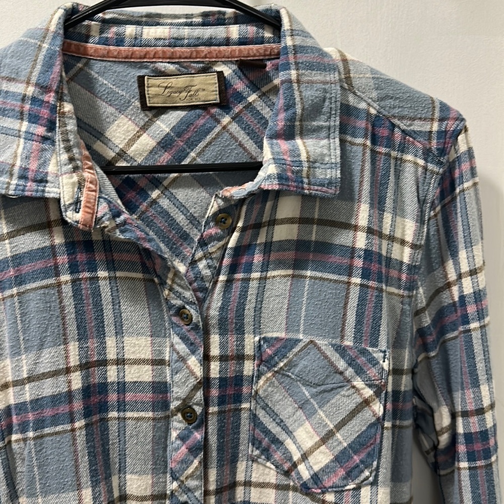 Legacy Falls for her plaid flannel shirt